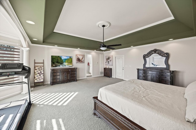 bedroom featuring carpet floors, crown molding, recessed lighting, a raised ceiling, and baseboards