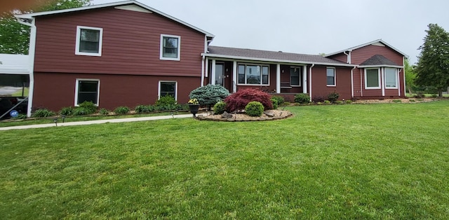 tri-level home with a front yard