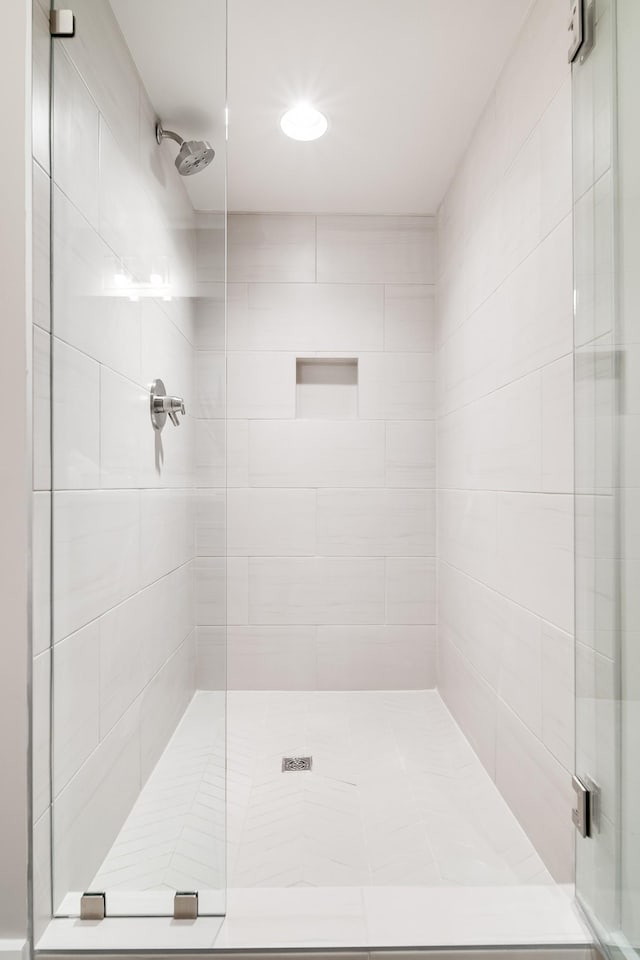 bathroom featuring a stall shower