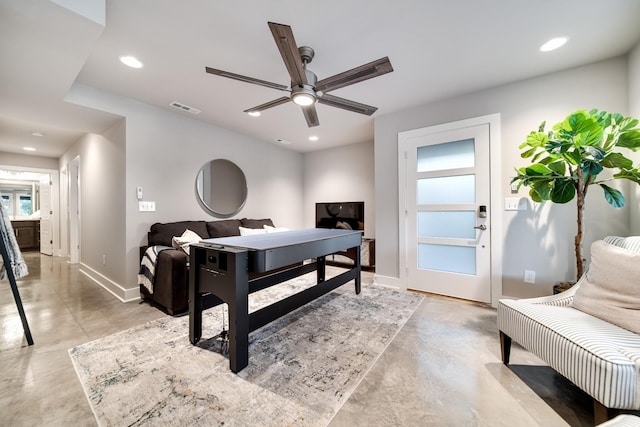 bedroom with visible vents, concrete floors, baseboards, and recessed lighting