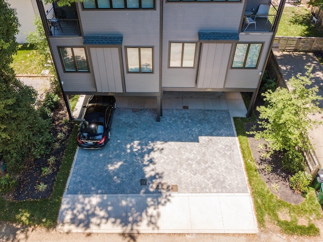 view of front of house with fence