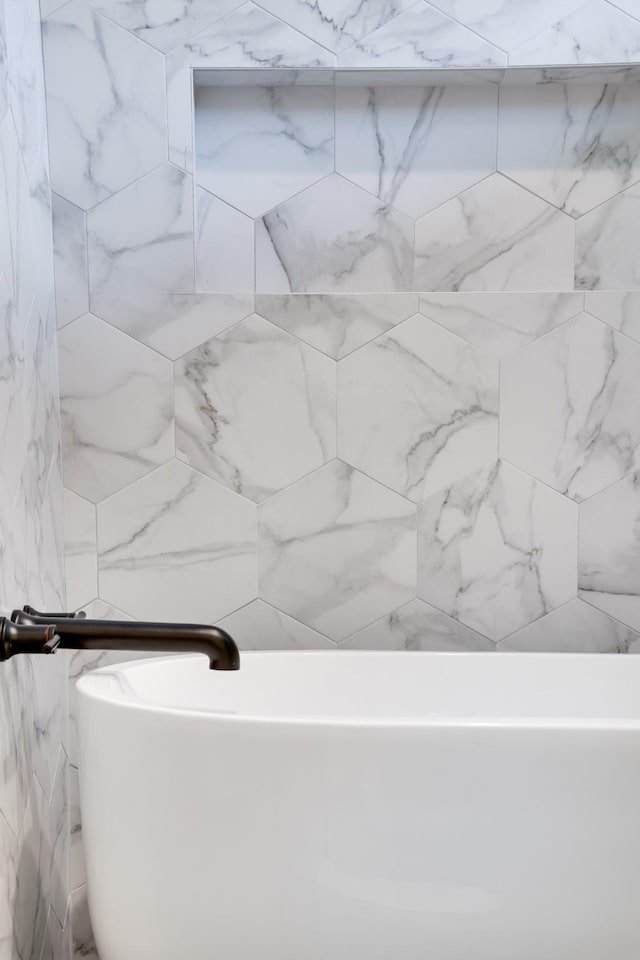 bathroom featuring a freestanding bath