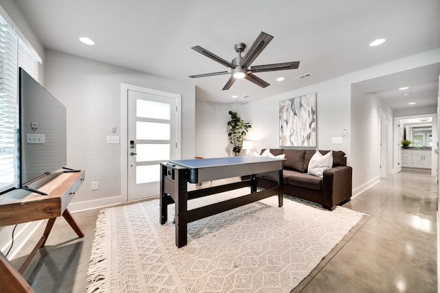 recreation room with visible vents, concrete floors, baseboards, and recessed lighting