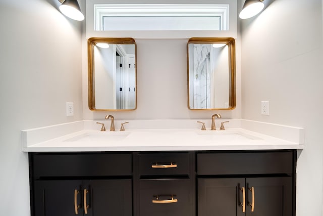 bathroom featuring double vanity and a sink