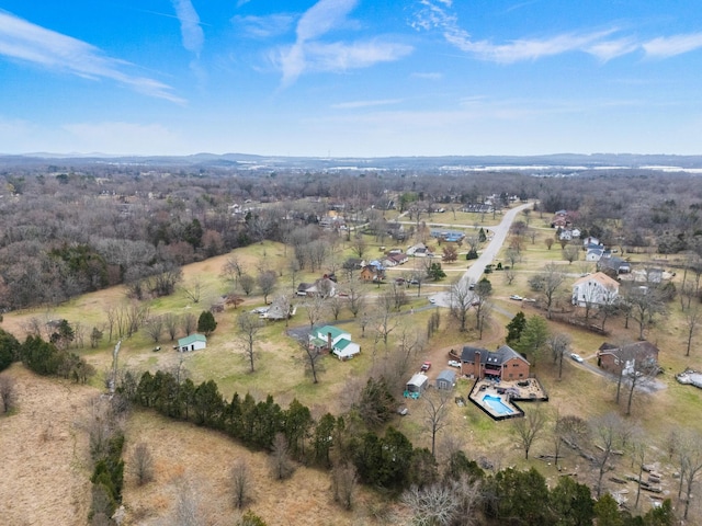 birds eye view of property with a rural view