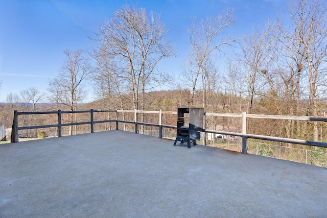 view of patio / terrace featuring fence