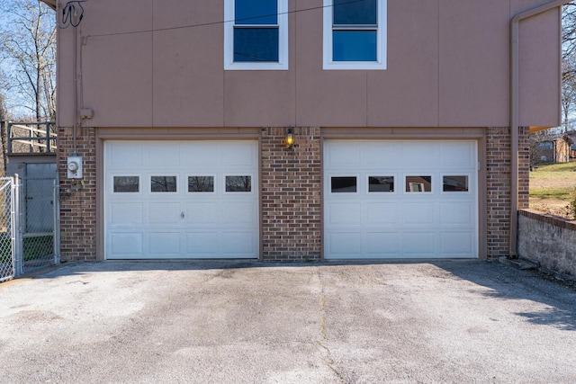 garage with driveway