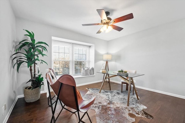 home office featuring ceiling fan, baseboards, and wood finished floors