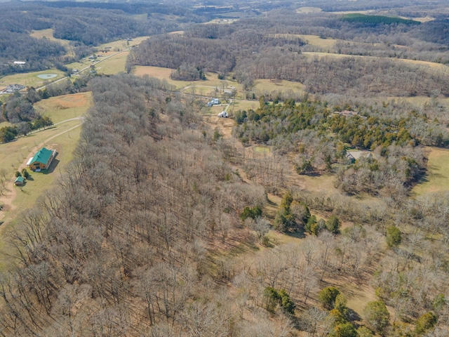 birds eye view of property with a rural view