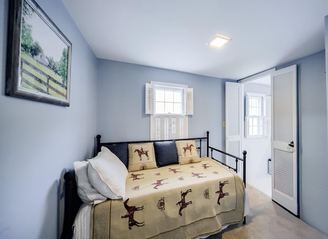 bedroom featuring carpet flooring