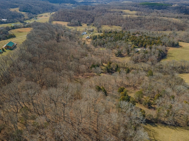 birds eye view of property with a rural view