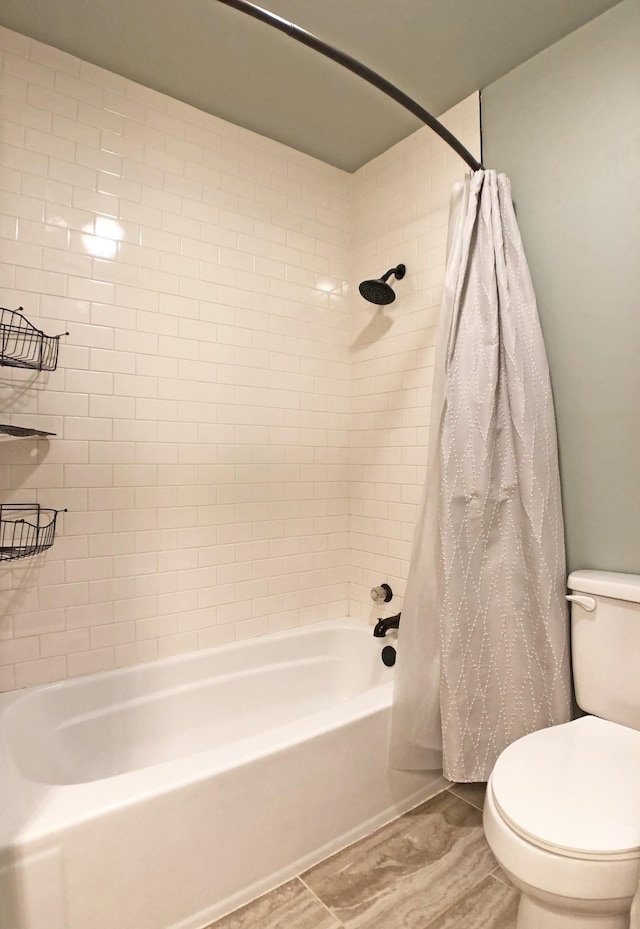 full bathroom featuring shower / bathtub combination with curtain and toilet