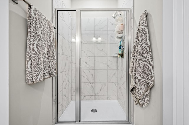 bathroom featuring a shower stall