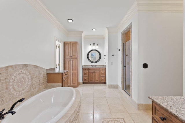 full bathroom with a garden tub, a sink, two vanities, ornamental molding, and a shower stall