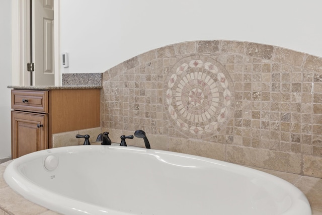 bathroom with a soaking tub