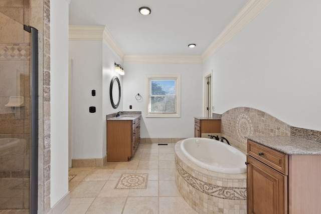 bathroom with a bath, a shower stall, ornamental molding, and a sink