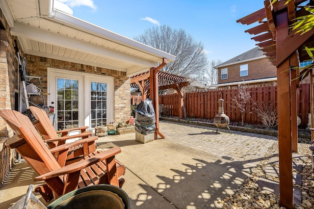 view of patio / terrace featuring fence