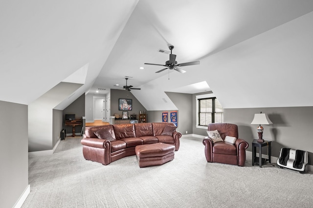 living area with carpet, visible vents, lofted ceiling, and baseboards