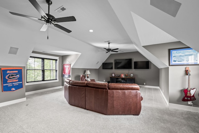 carpeted living room featuring visible vents, vaulted ceiling, baseboards, and ceiling fan