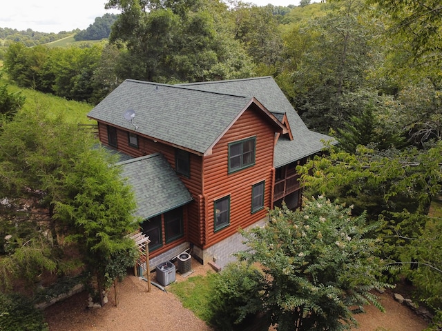 aerial view featuring a forest view