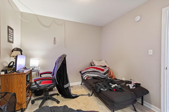 office area with wood finished floors and baseboards