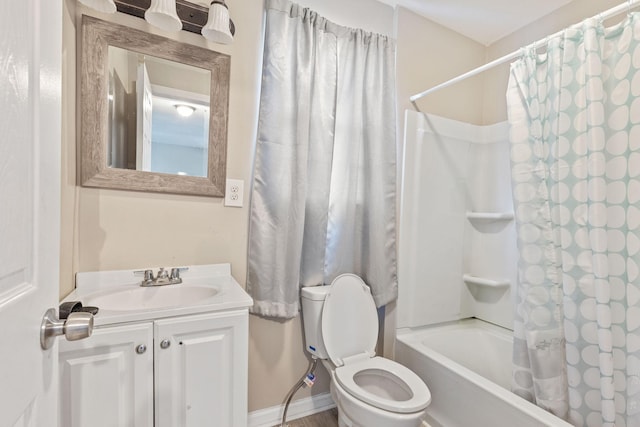 bathroom with toilet, shower / bath combo with shower curtain, and vanity