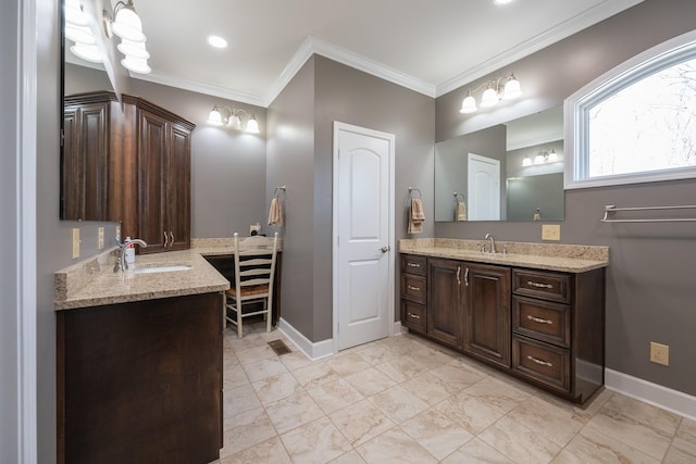 full bathroom with visible vents, baseboards, a sink, crown molding, and two vanities