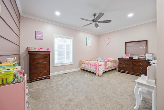 carpeted bedroom featuring ceiling fan, baseboards, crown molding, and recessed lighting