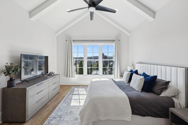 bedroom with light wood-type flooring, a ceiling fan, high vaulted ceiling, and beam ceiling