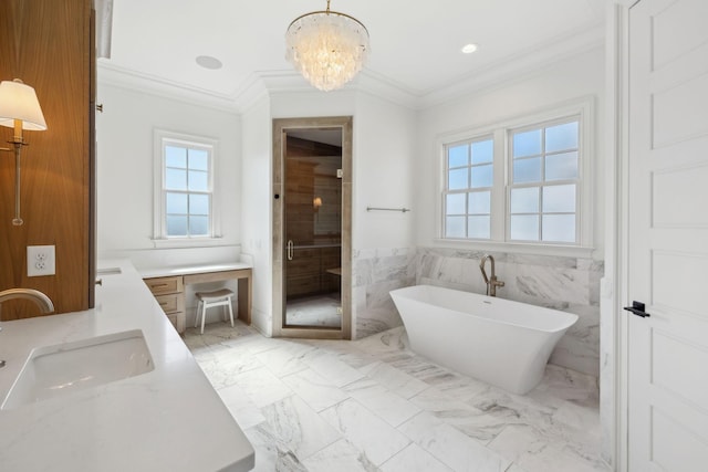 bathroom with a freestanding tub, vanity, marble finish floor, a shower stall, and crown molding