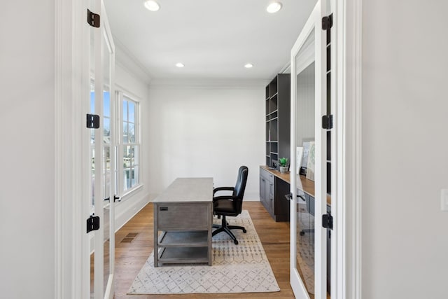 office area featuring recessed lighting, wood finished floors, baseboards, french doors, and crown molding