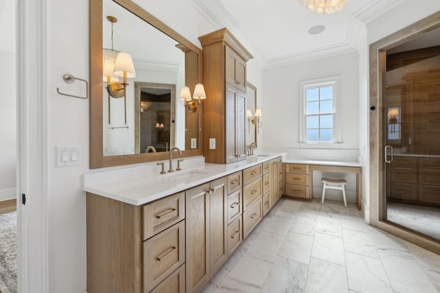 bathroom with marble finish floor, crown molding, a sink, and a shower stall