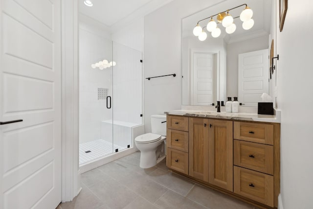 full bathroom featuring crown molding, toilet, a stall shower, vanity, and tile patterned flooring