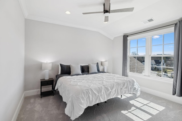 bedroom featuring baseboards, visible vents, vaulted ceiling, and carpet flooring