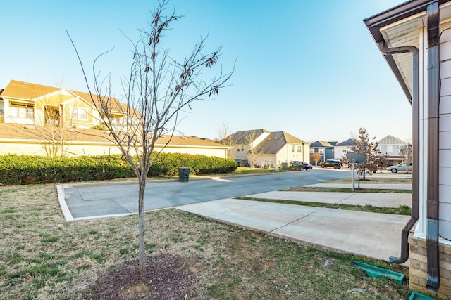 view of yard featuring a residential view