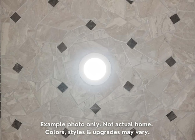 details featuring a tile shower