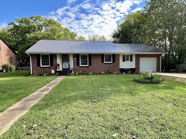 single story home featuring driveway, a garage, metal roof, crawl space, and a front lawn