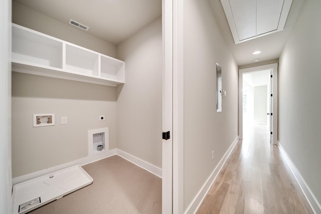 clothes washing area featuring laundry area, attic access, visible vents, hookup for a washing machine, and hookup for an electric dryer