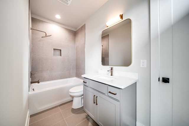 full bath featuring shower / washtub combination, visible vents, toilet, vanity, and tile patterned flooring