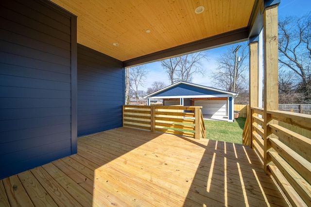 wooden deck with fence and an outdoor structure