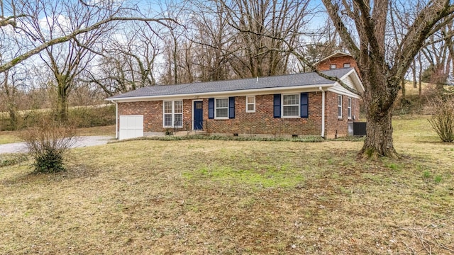 ranch-style home featuring crawl space, a front lawn, and brick siding