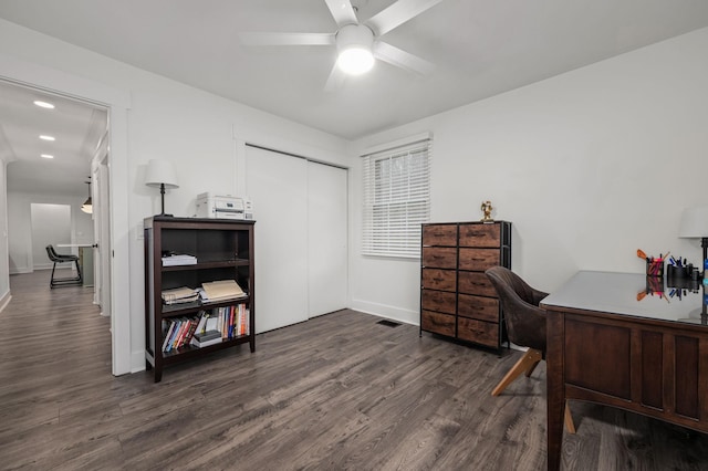 office space with ceiling fan, wood finished floors, visible vents, and baseboards