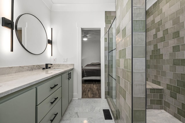 full bathroom with visible vents, marble finish floor, walk in shower, and vanity