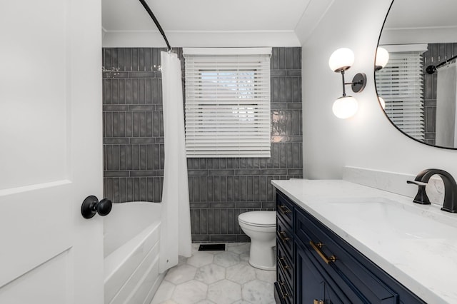 bathroom featuring ornamental molding, shower / bath combo, vanity, and toilet