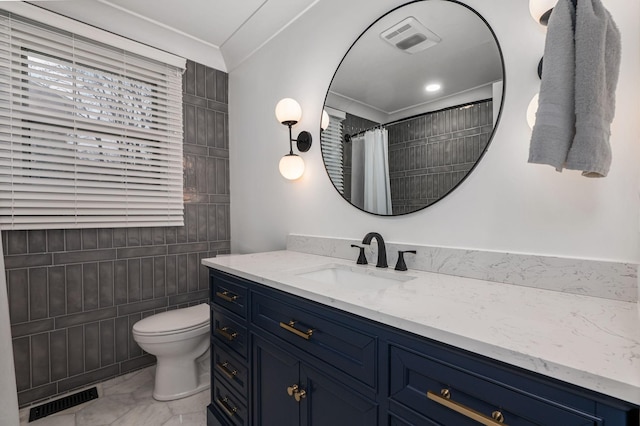 full bath with marble finish floor, visible vents, vanity, and toilet