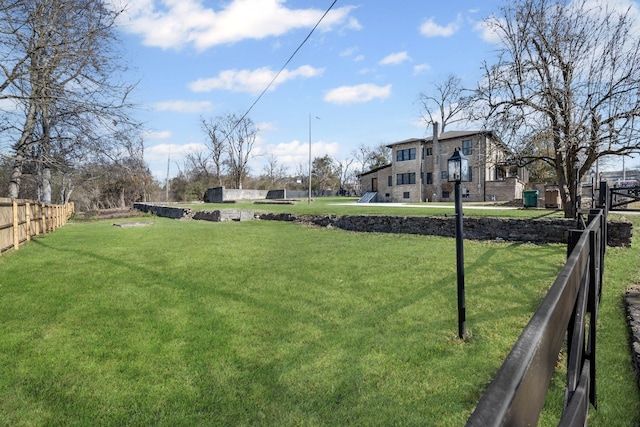 view of yard with fence