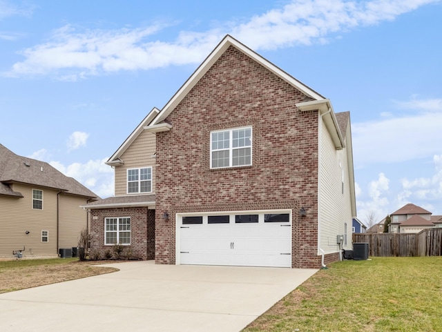 traditional-style home featuring driveway, a front yard, and brick siding