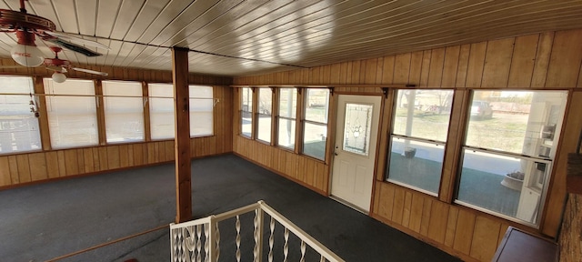 unfurnished sunroom with vaulted ceiling