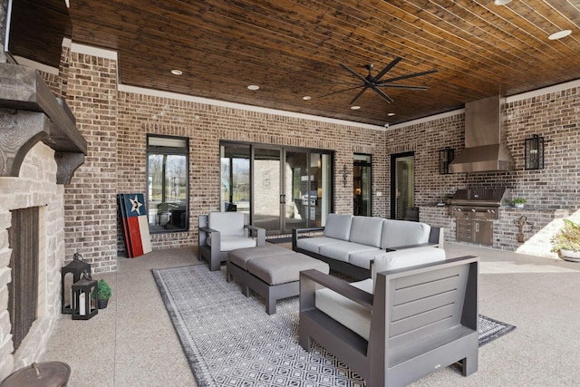 view of patio / terrace featuring an outdoor hangout area, ceiling fan, an outdoor kitchen, and a grill