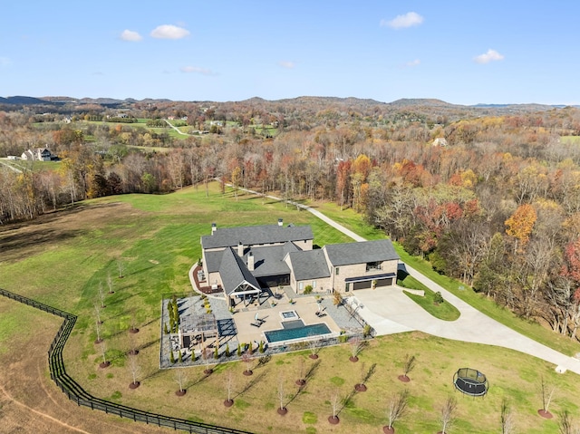 aerial view featuring a view of trees